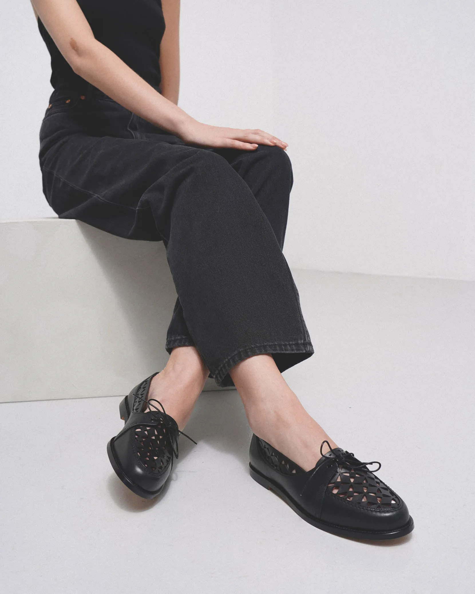 Delirium black laser cut leather loafer